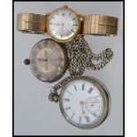 A silver metal cased pocket watch stamped to the movement Moulinie Geneve along with another silver