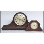 Two early to mid century oak cased mantle clocks,