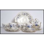 Colclough - A mid 20th century tea service by Colclough decorated with blue flowers consisting of