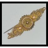 A Victorian 9ct gold ladies oval bar brooch with photo panel back,