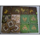 A collection of late 19th and early 20th century fireside ceramic tiles,