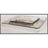 A collection of five mid 20th century vintage industrial oversized enamel trays,