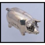 A silver hallmarked  pig figurine.