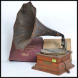 Old gramophone with 'the New Cecil Zonophone' mark and morning glory ebonised tin horn