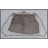 A silver hallmarked ladies large mesh purse and chain.
