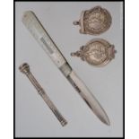 A silver hallmarked penknife with mother of pearl handle together with a silver propelling pencil,