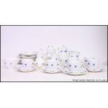 A 20th century Staffordshire blue and white tea service by Adderley  in the Wedgwood style.