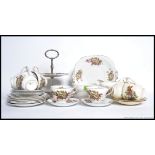 A vintage Chintz pattern Staffordshire tea service comprising cups, saucers plates etc.