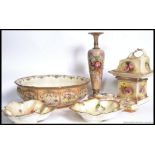 A Collection of ivory blush ceramics to include a vase pedestal, washbowl, leaf dishes, soap dishes,