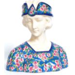 A 20th century Longwy style ceramic bust of a 1930's flapper girl. Hand painted.  Approx 24cm x 25.