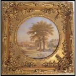 An antique style Viennese wall plaque with printed pictorial, in a gilt frame.