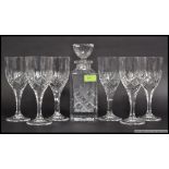 A set of six Boynme Valley lead crystal wine glasses along with an matching decanter 25cm tall