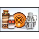 A collection of retro West German pottery to include vases and a Fat Lave drip glaze fruit bowl.