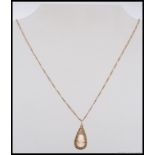 A 20th century 9ct gold vintage ladies necklace and cameo pendant.
