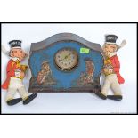 An unusual mid century V Victory chocolate tin with original inset clock together with a pair of