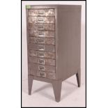 A vintage mid century industrial upright metal ten short drawer filing cabinet,