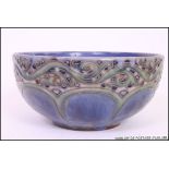 A 19th century Doulton Lambeth Art Nouveau blue glaze bowl.