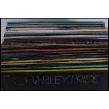 A collection of long play country and western vinyl records by various artists to include Charlie