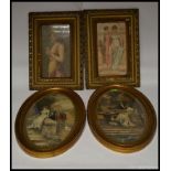 A pair of early 20th century prints of classical scenes set in gilt oval frames.