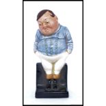A small Royal Doulton Large early figurine entitled ' Fat Boy '  bearing green back stamp to base.