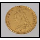 An 1887 half sovereign gold coin bearing Queen Victoria - Jubilee bust ( see illustrations ) Weight