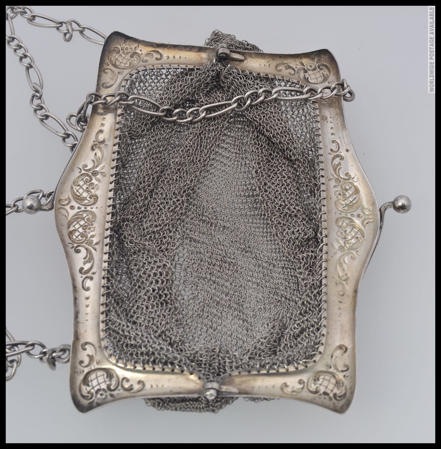 A silver hallmarked ladies large mesh purse and chain. - Image 2 of 3