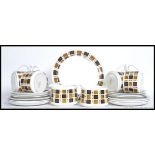 A retro fine bone china  tea service by Elixabethan in the ' Checkmate ' service consisting of six