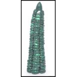 An unusual 20th century stone / malachite statue ornament of pointed form.