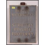 An Industrial Mid century  vintage Bristol Water cast metal Industrial advertising sign with pole