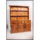 A 20th century country pine welsh dresser.