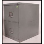 A retro 20th century Industrial metal 2 drawer office filing cabinet with notation slides and