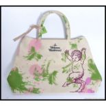 Vivienne Westwood - A Vivienne Westwood unused hand bag / make up bag along with a Vivienne