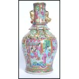 A 19th century Chinese Canton famille rose flange shouldered vase.