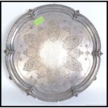 A good quality Victorian Scottish heavy silver plate salver tray with geometric cartouche design to