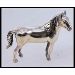 A 925 white metal / silver figure of a miniature horse L4cm 16.