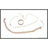 A 9ct gold curb link bracelet along with a 9ct gold necklace along with a brass ring