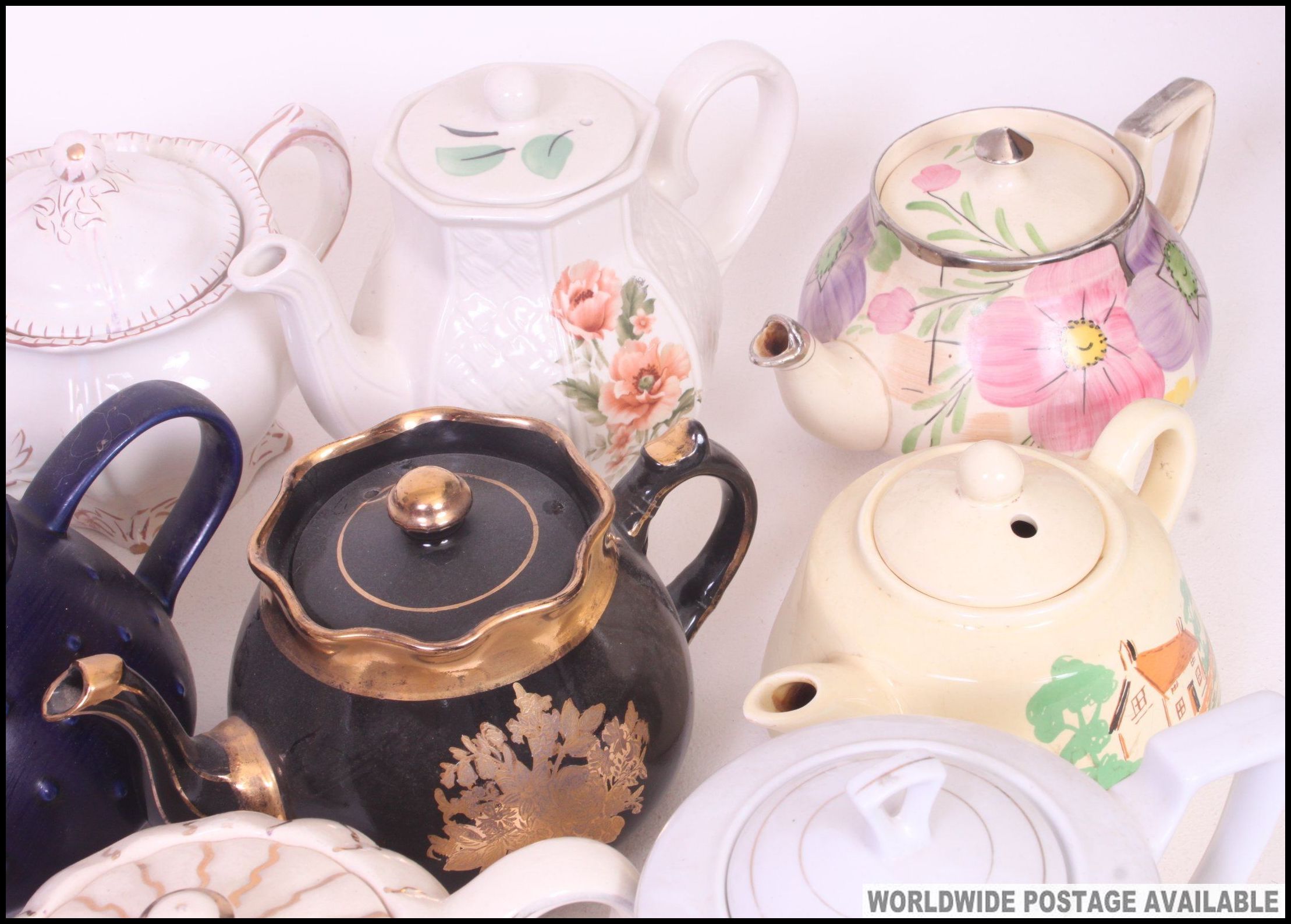 A large collection of teapots to include various shapes and patterns. - Image 3 of 3