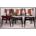 A set of 1960's six butterfly wing chairs by E Gomme for G Plan,