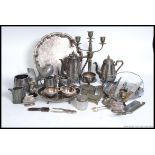 A good quantity of silver plated wares to include salver, bon bon basket, candelabra, teapots,