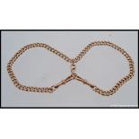An early 20th century 9ct gold twin chain albert bracelet. total weight 47.