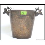 A vintage 20th century silver plated ice bucket - champagne bucket with stag head handles - hunting
