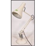 A vintage industrial style white Herbert Terry anglepoise reading lamp light