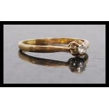 An early 20th century single stone 18ct gold diamond solitaire ring. The single stone approx 8pnts.