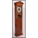 A NATIONAL TIME RECORDER CO LIMITED CLOCKING IN/OUT WALL CLOCK having a later conversion into a