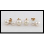 2 sets of ladies 9ct gold pearl earrings  - studs. Each cultured pearl on stud setting.