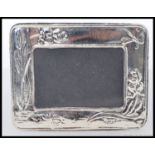 A 925 white metal / silver easel back picture frame.