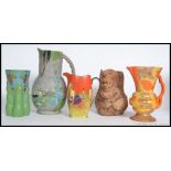 A collection of Art Deco ceramic jugs to include hand painted with examples by Rubian Art,