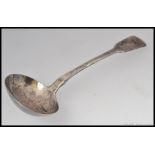 A Georgian silver hallmarked ladle having a London assay mark dated to 1805. 44.