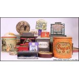 A collection of vintage tins from the 20th century to include large Sugar tin, biscuit tins,