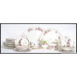 A Royal Albert Lavender Rose chintz pattern tea service comprising cups, saucers, plates,